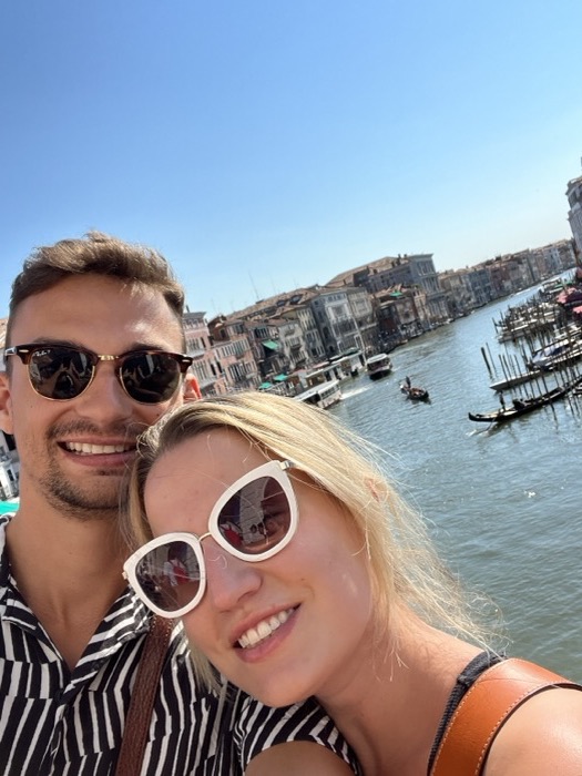 Michal and Austin on a canal in Venice